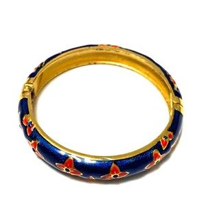 Gold tone enamel blue red bangle 9 inches around
